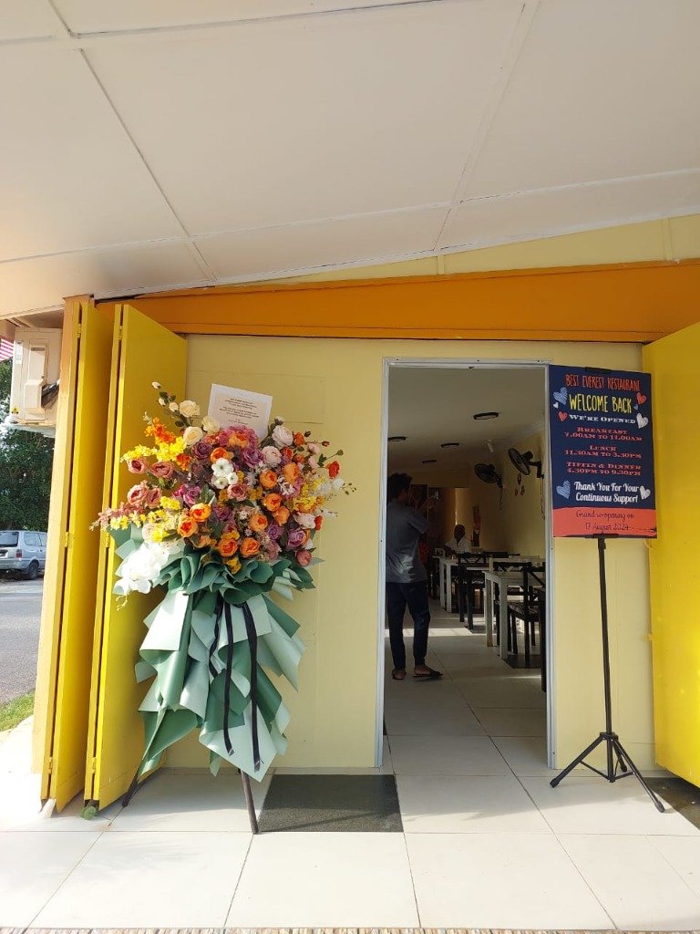 Best Everest Restaurant Entrance, Welcoming Decor and Dining Area